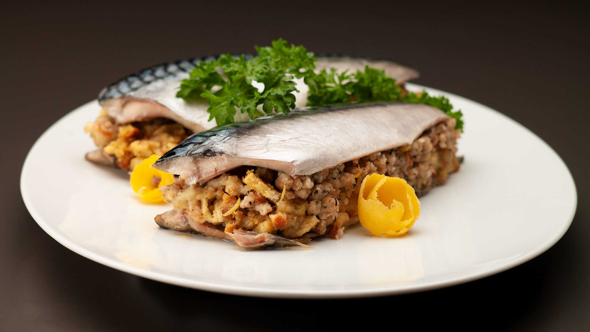 chef prepared and plated Atlantic Mackerel with lemon stuffing