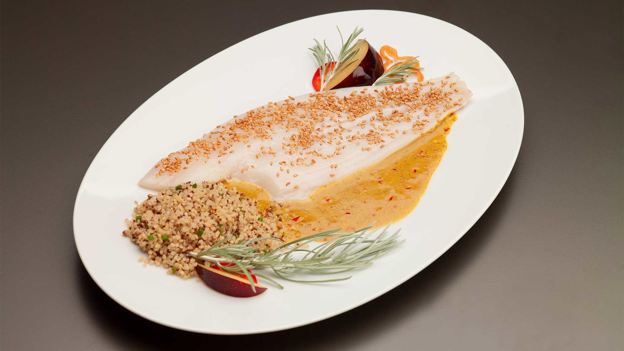 plated sesame seed coated flounder with curry sauce